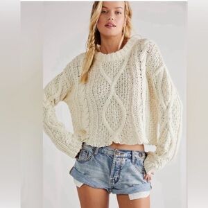 Free People Cutting Edge Cropped Cable
Knit Sweater